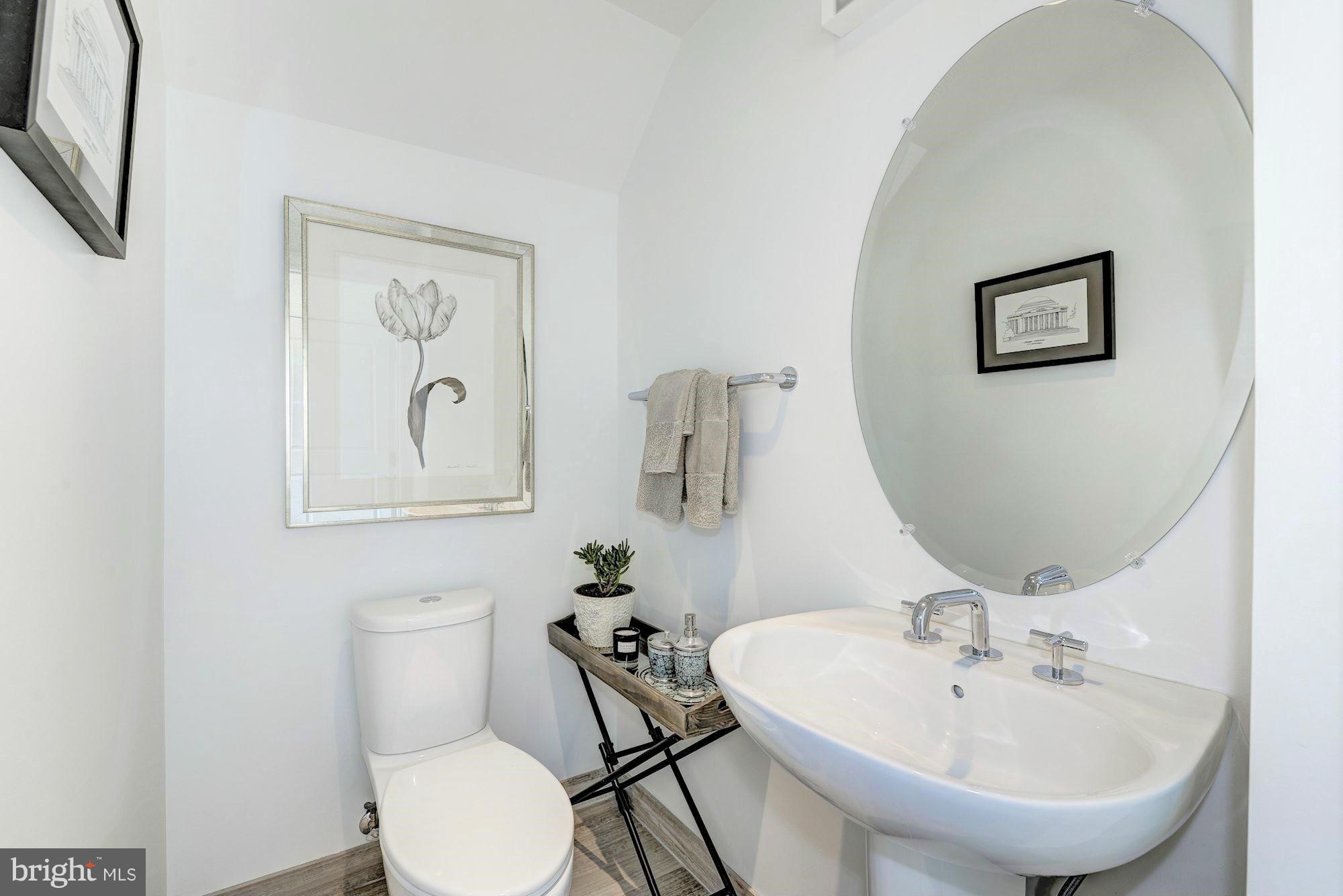 3052 R Street Northwest, Unit 303 Washington, DC 20007 - Photo 6 of 30 POWDER ROOM ON MAIN LEVEL