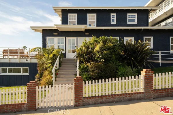 a view of swimming pool with outdoor seating