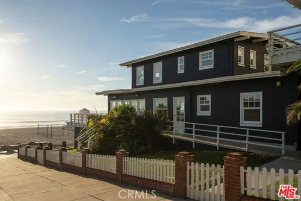 a view of a balcony with ocean view