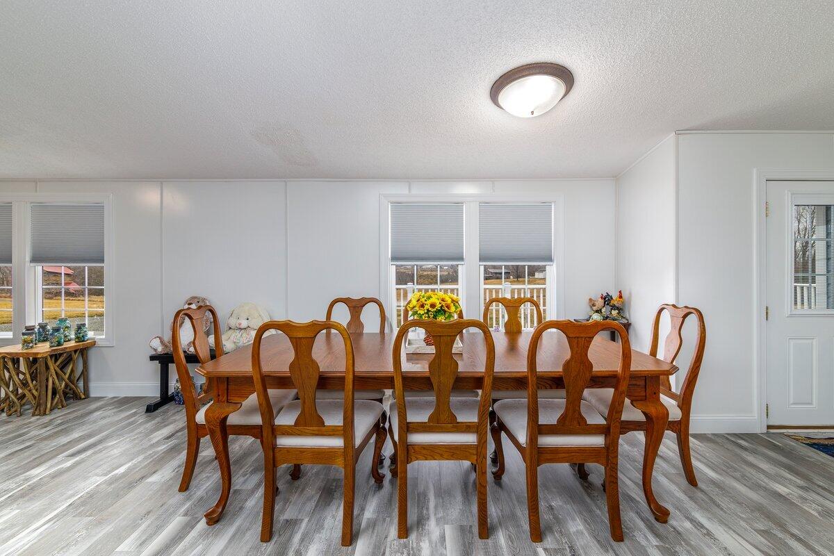 652 Marcus-823 Road Rocky Mount, VA 24151 - Photo 17 of 34 a view of a dining room with furniture and wooden floor