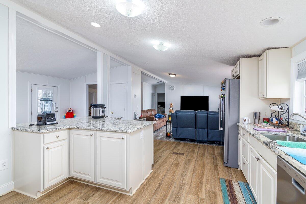 652 Marcus-823 Road Rocky Mount, VA 24151 - Photo 9 of 34 a kitchen with a sink and cabinets