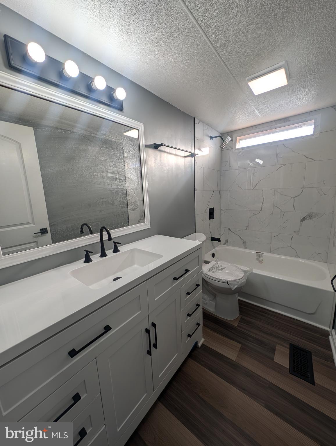 230 Poclain Road Aberdeen, MD 21001 - Photo 5 of 10 a bathroom with double vanity and a mirror