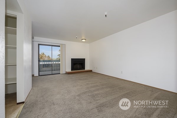 409 Southwest 155th Street Burien, WA 98166 - Photo 14 of 22 an empty room with windows