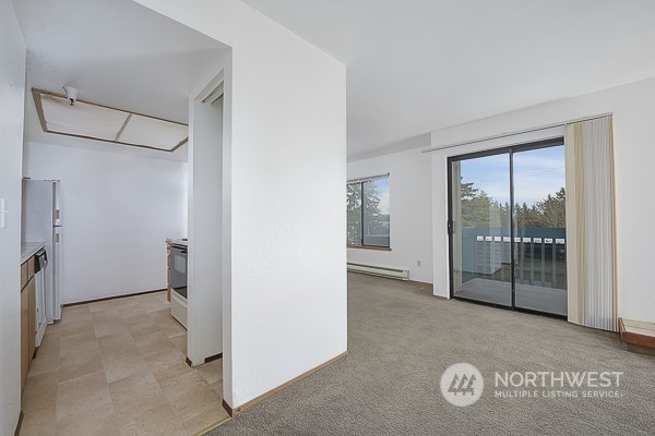 409 Southwest 155th Street Burien, WA 98166 - Photo 18 of 22 a view of empty room with sliding door