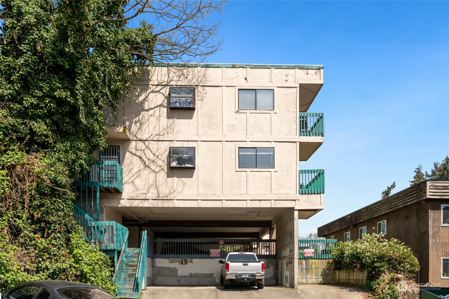 409 Southwest 155th Street Burien, WA 98166 - Photo 9 of 22 a view of building with large windows