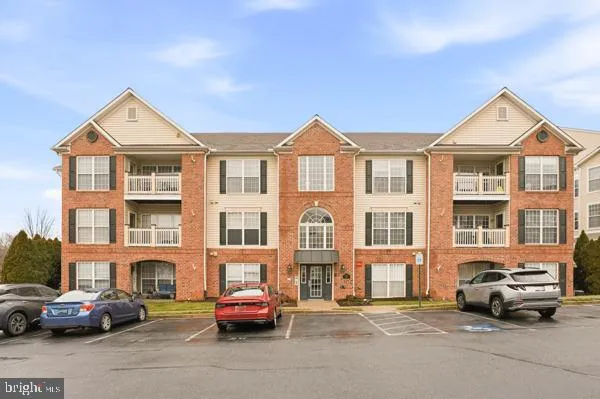 a cars parked in front of a house