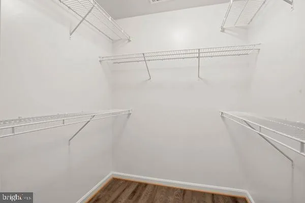 a view of a room with racks on the wall