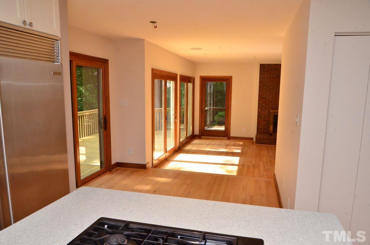 10033 Old Warden Road Raleigh, NC 27615 - Photo 5 of 30 Island w/sight lines to breakfast area, family room and outdoors.