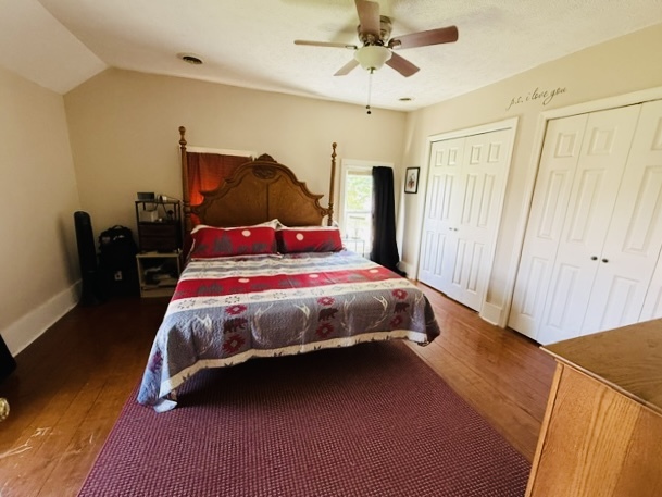 22503 2800th Road North Odell, IL 60460 - Photo 24 of 30 a bedroom with a bed and a chandelier