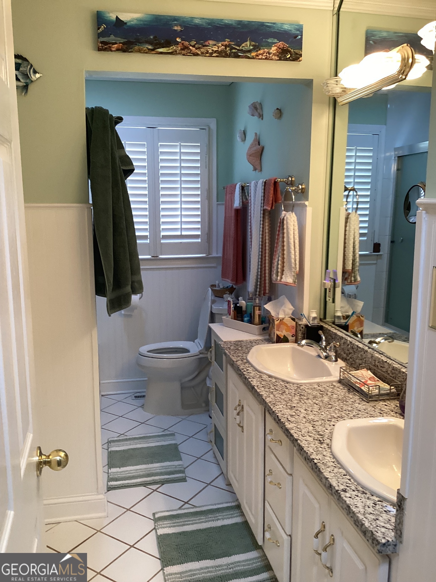 2779 Bob Cox Road Marietta, GA 30064 - Photo 28 of 48 a bathroom with a granite countertop sink and a mirror