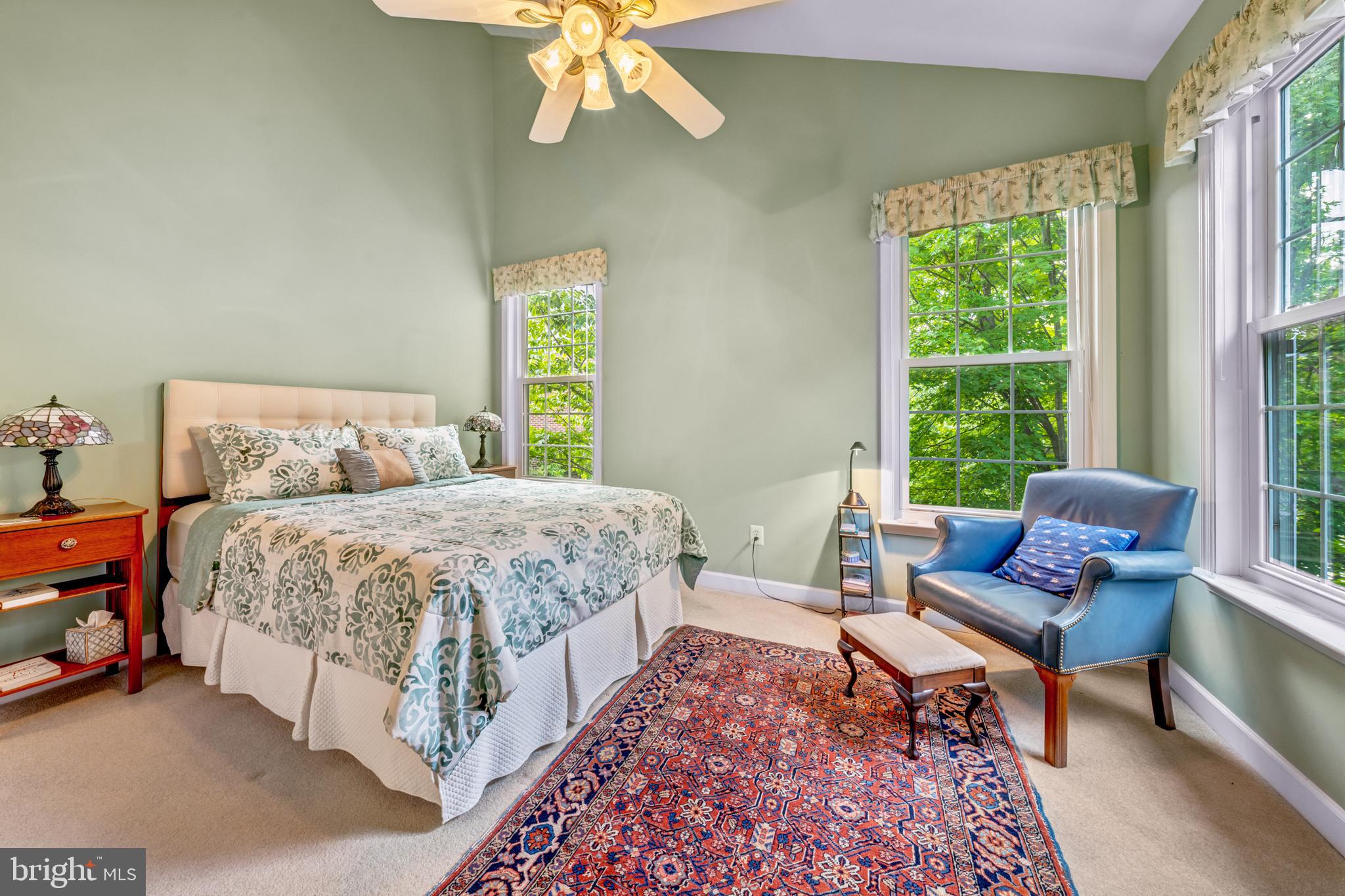 1925 Logan Manor Drive Reston, VA 20190 - Photo 26 of 61 a bedroom with a bed chair and a window