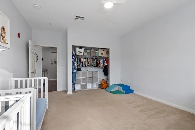 a view of livingroom with furniture and closet