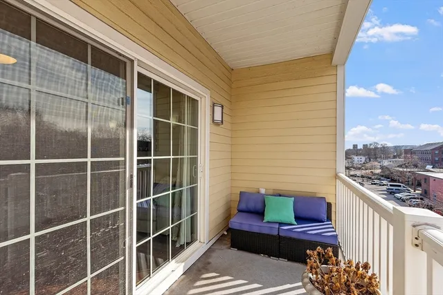a view of a balcony with chair