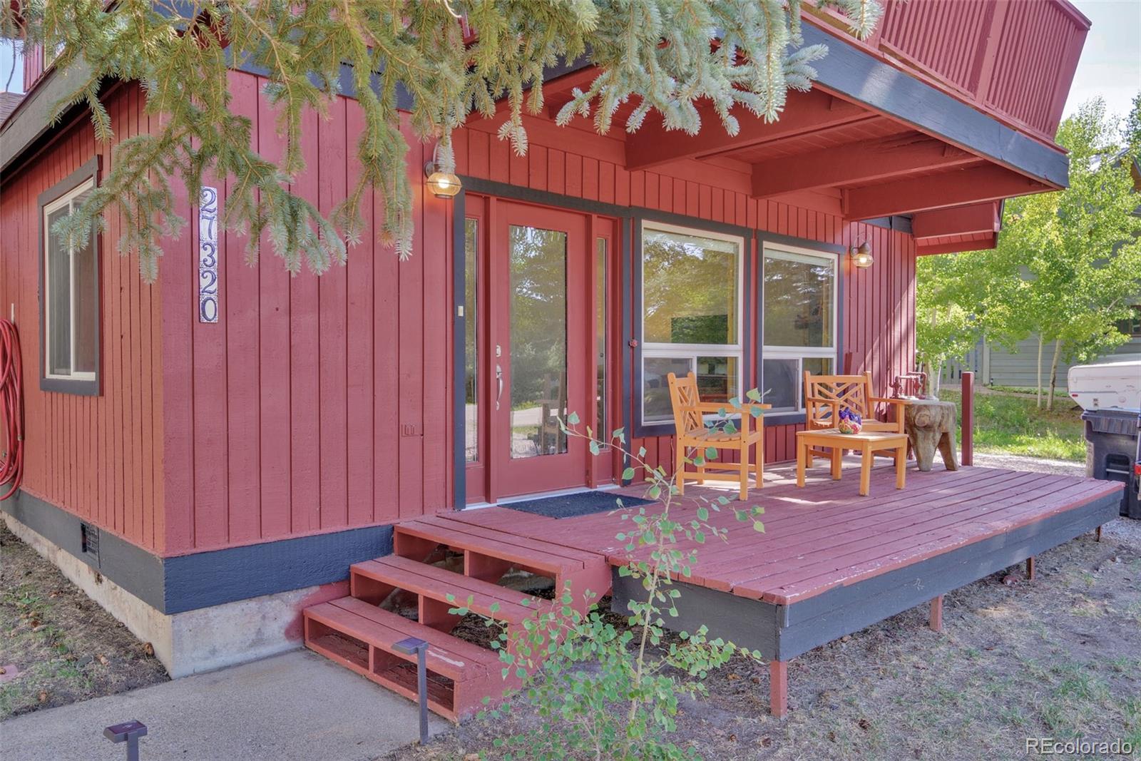 27320 Moonlight Way Steamboat Springs, CO 80487 - Photo 18 of 37 a view of a chairs and table in the backyard