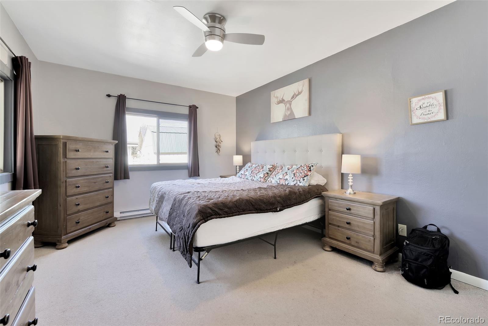 27320 Moonlight Way Steamboat Springs, CO 80487 - Photo 8 of 37 a bedroom with a bed and a window