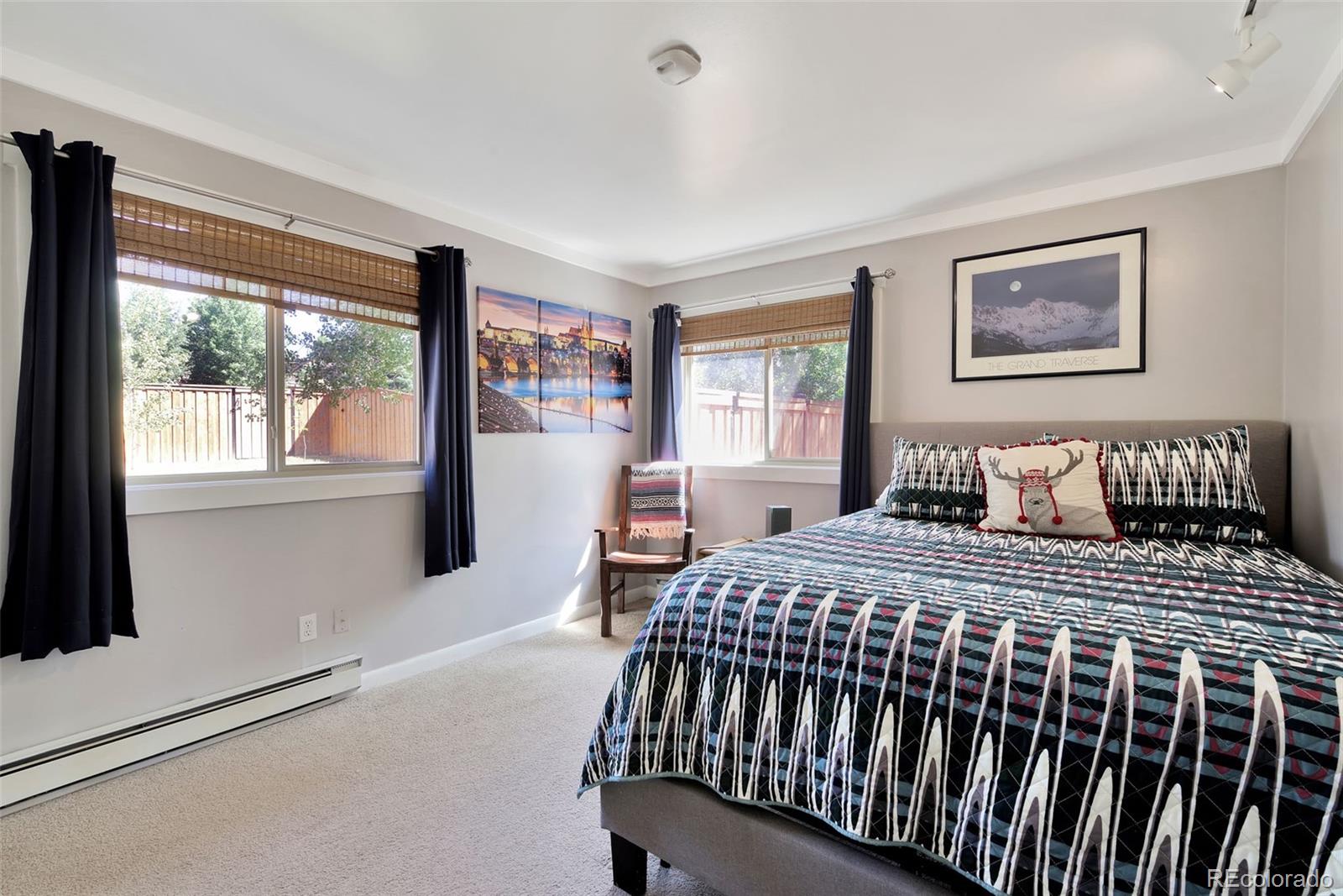 27320 Moonlight Way Steamboat Springs, CO 80487 - Photo 9 of 37 a bedroom with a bed and wooden floor