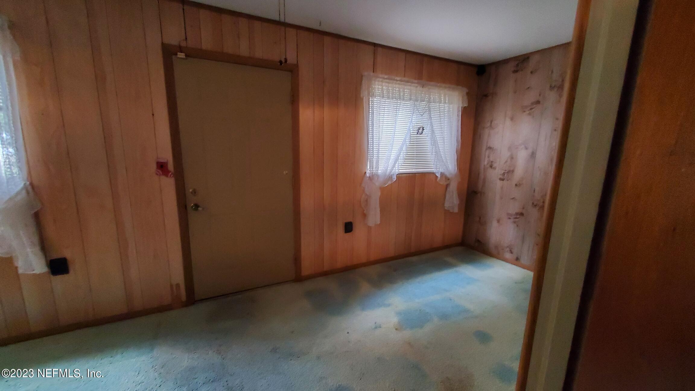 2135 Chaffee Road South Jacksonville, FL 32221 - Photo 4 of 15 Enclosed Front Porch