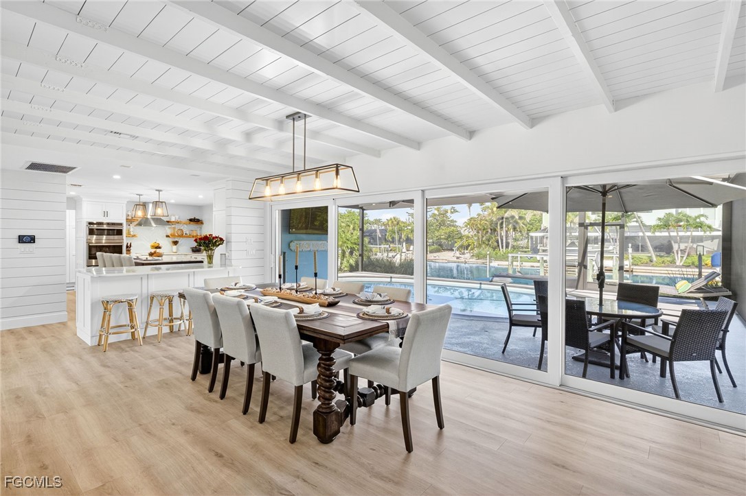 941 Pecten Court Sanibel, FL 33957 - Photo 16 of 44 a view of a dining room with furniture window and outside view