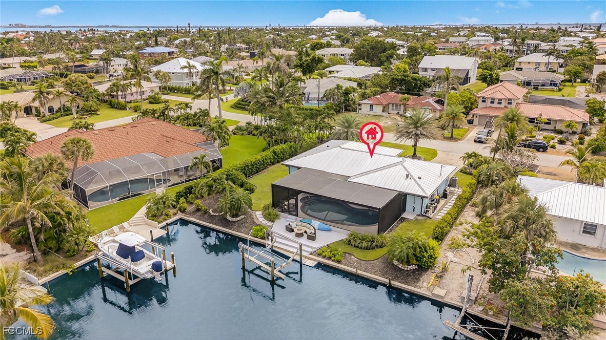 941 Pecten Court Sanibel, FL 33957 - Photo 3 of 44 an aerial view of residential houses with outdoor space
