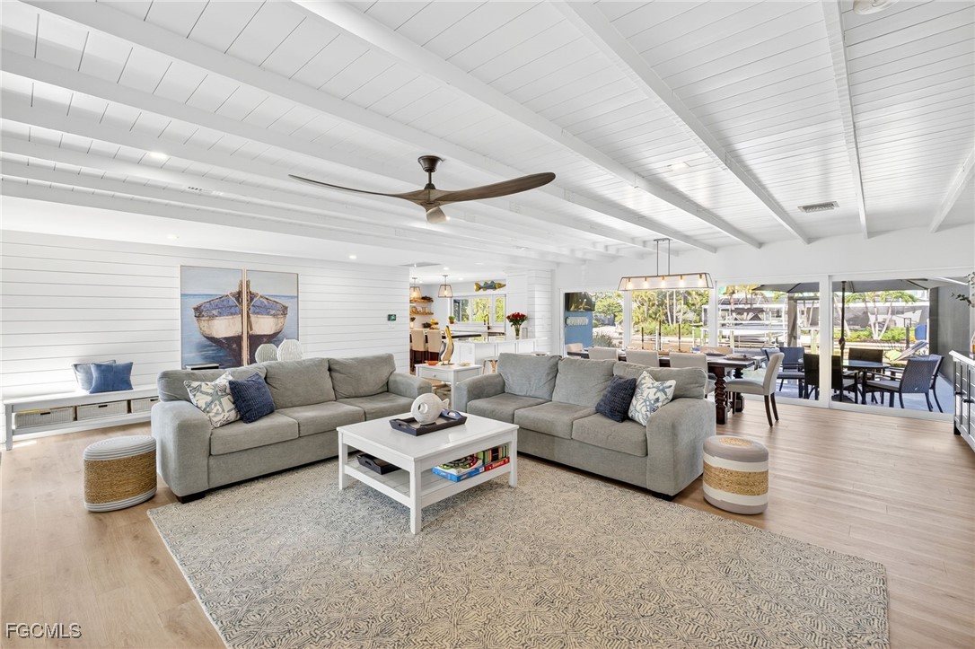 941 Pecten Court Sanibel, FL 33957 - Photo 5 of 44 a living room with furniture and a large window