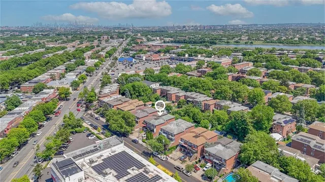 an aerial view of a city with lots of residential buildings