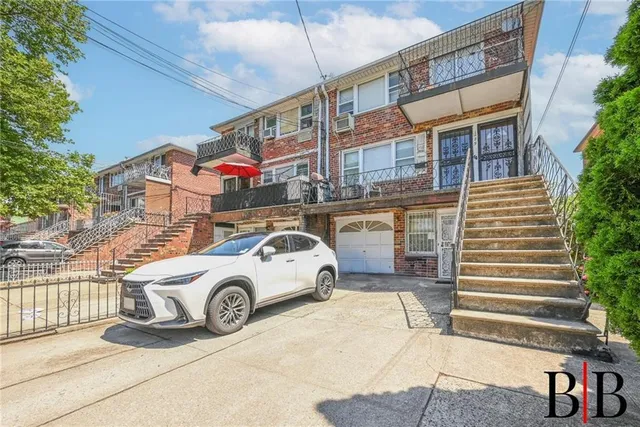 a car parked in front of a building