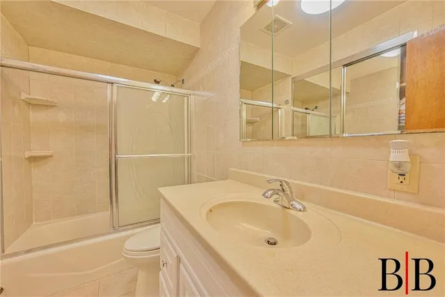 a bathroom with a sink and a shower