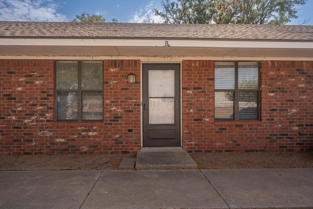 4200 South Austin Street, Unit B Amarillo, TX 79110 - Photo 1 of 13 a front view of a house with a shower