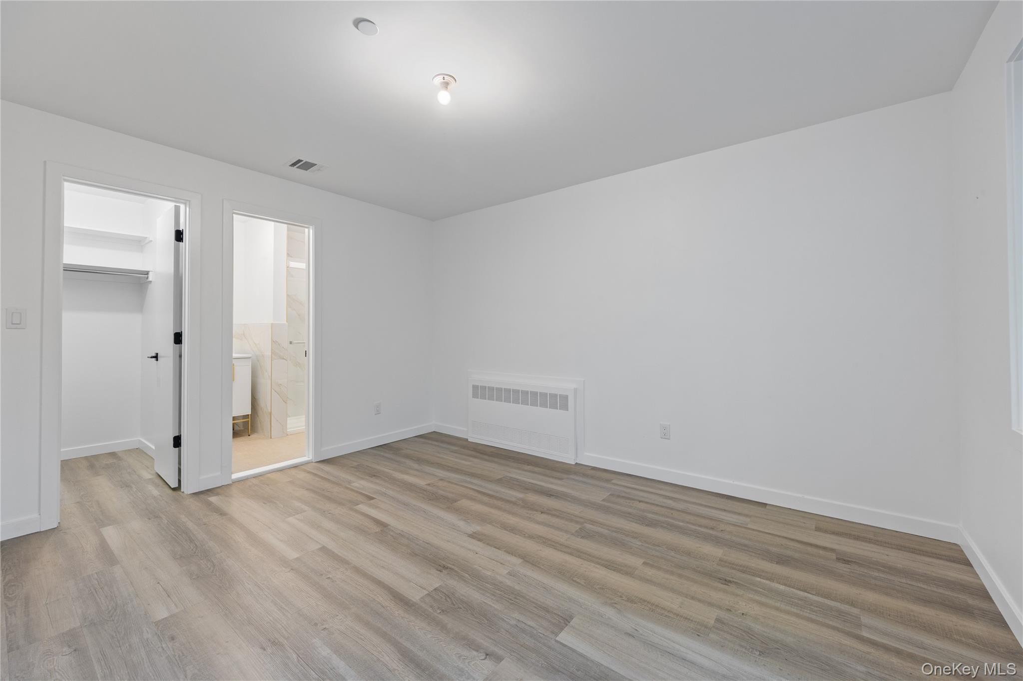 40 Singer Avenue, Unit 214 Spring Valley, NY 10977 - Photo 42 of 49 Primary bedroom