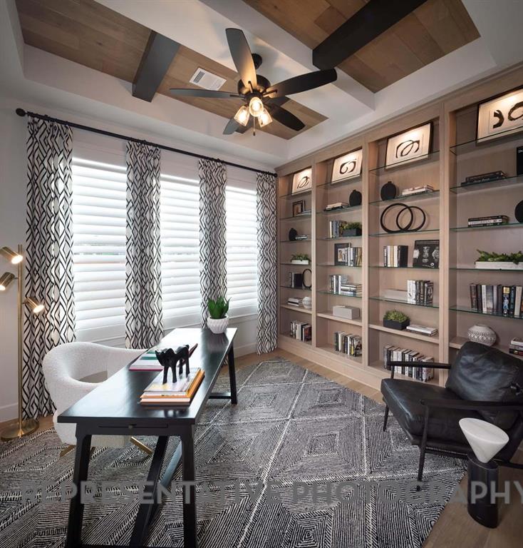 930 Heatherbrook Drive Prosper, TX 75078 - Photo 20 of 37 a living room with furniture a table and a large window