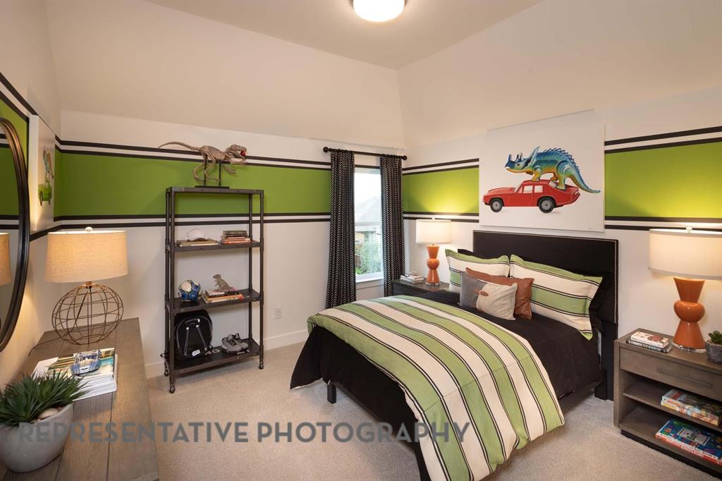 930 Heatherbrook Drive Prosper, TX 75078 - Photo 23 of 37 a bedroom with a bed and a window