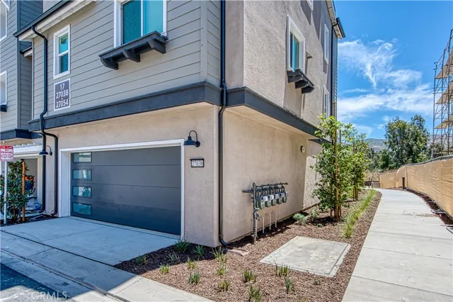 a view of a wooden door of the house
