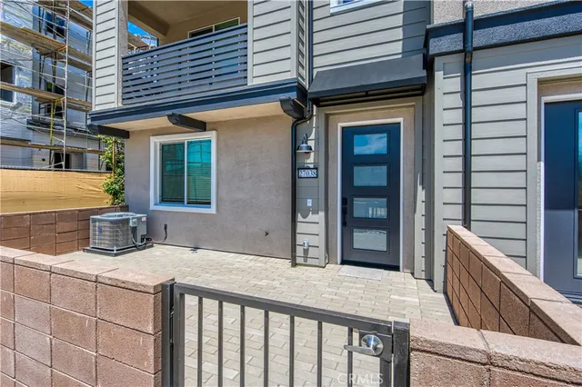 a view of a house with a wooden door
