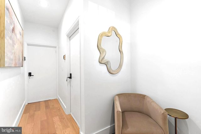 a picture of a bathroom with a sink and mirror