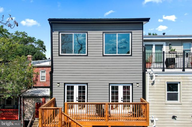 a view of front a house with large windows