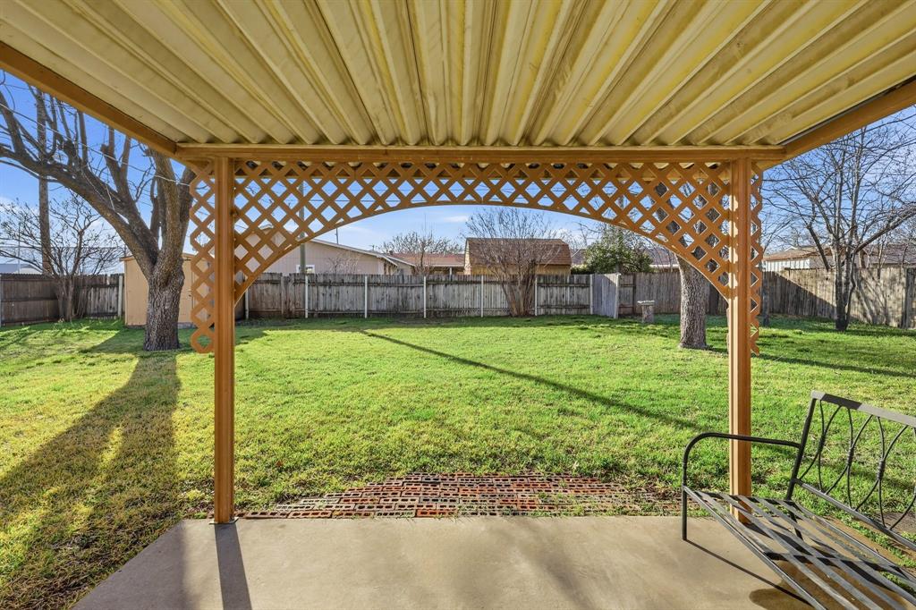 816 Ruidoso Drive Saginaw, TX 76179 - Photo 14 of 22 a view of a porch and garden