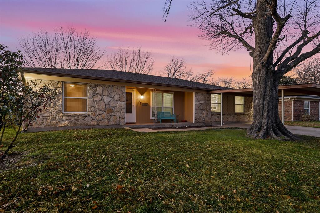 816 Ruidoso Drive Saginaw, TX 76179 - Photo 18 of 22 a view of a yard with a house and a large tree