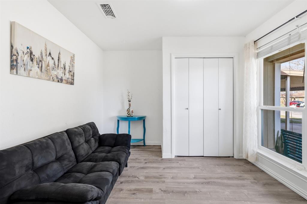 816 Ruidoso Drive Saginaw, TX 76179 - Photo 4 of 22 a living room with furniture and a window
