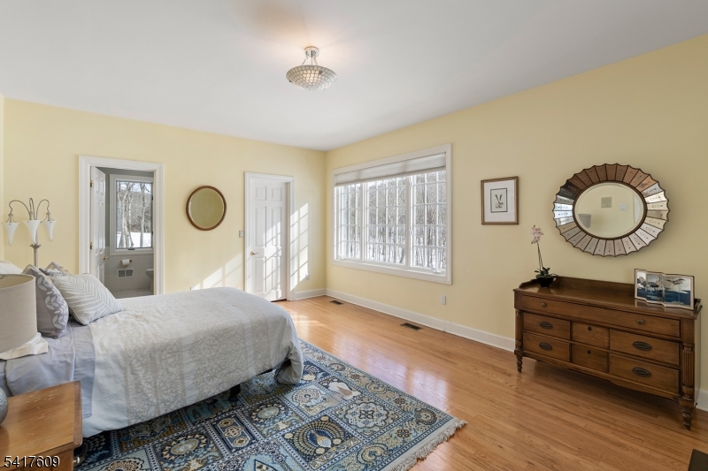 2 Cobblefield Road Mendham, NJ 07945 - Photo 33 of 50 a bedroom with a bed and a dresser