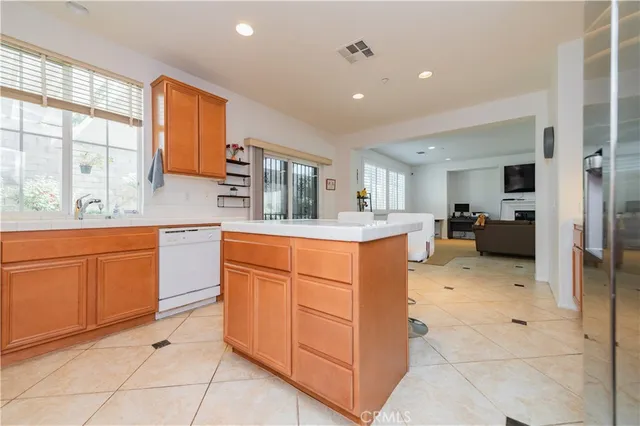 a kitchen with cabinets a sink and a counter top space