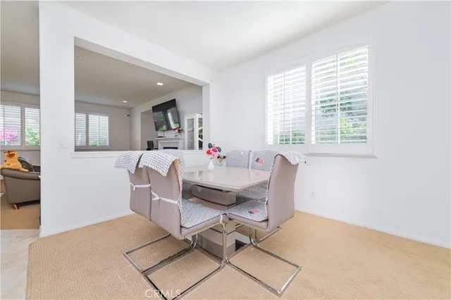 a workspace with furniture and a window