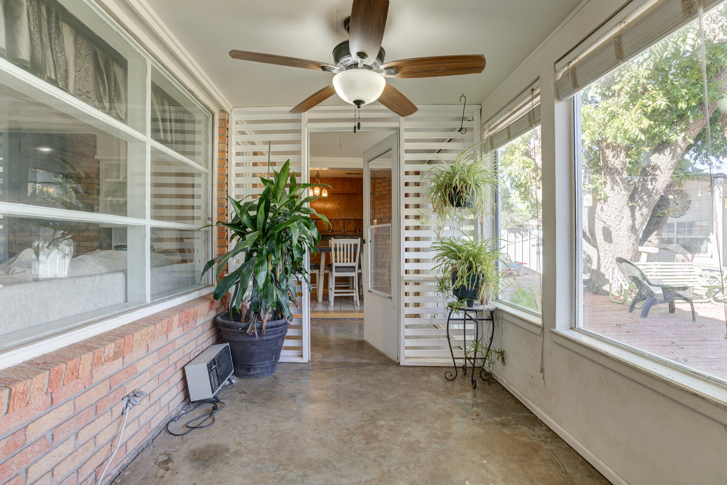 2120 53rd Street Lubbock, TX 79412 - Photo 24 of 32 a view of an entryway with garden