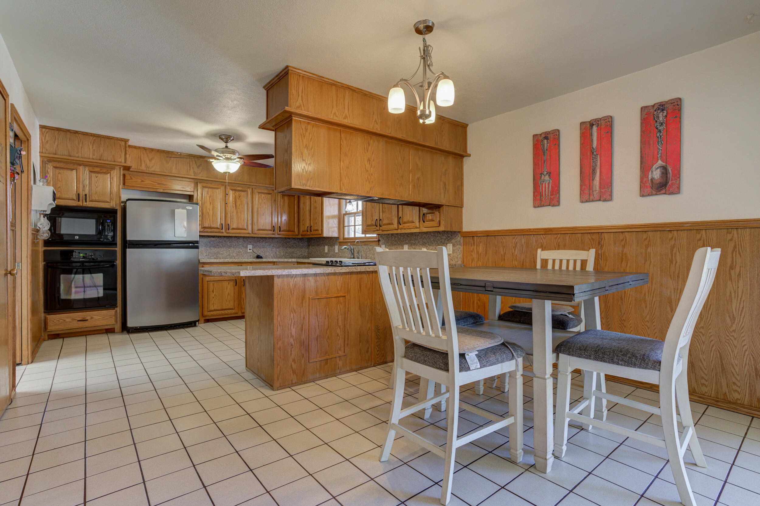 2120 53rd Street Lubbock, TX 79412 - Photo 9 of 32 a view of a dining room with furniture