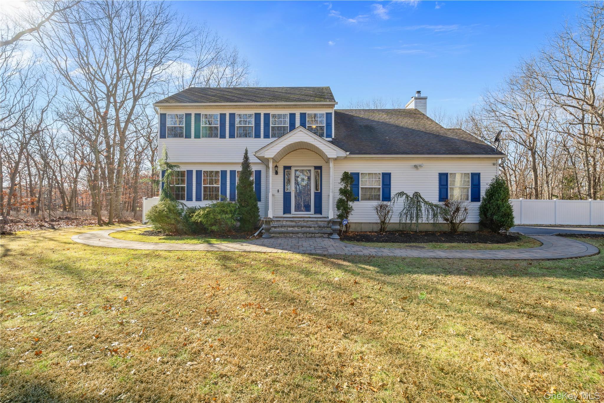 a front view of a house with swimming pool