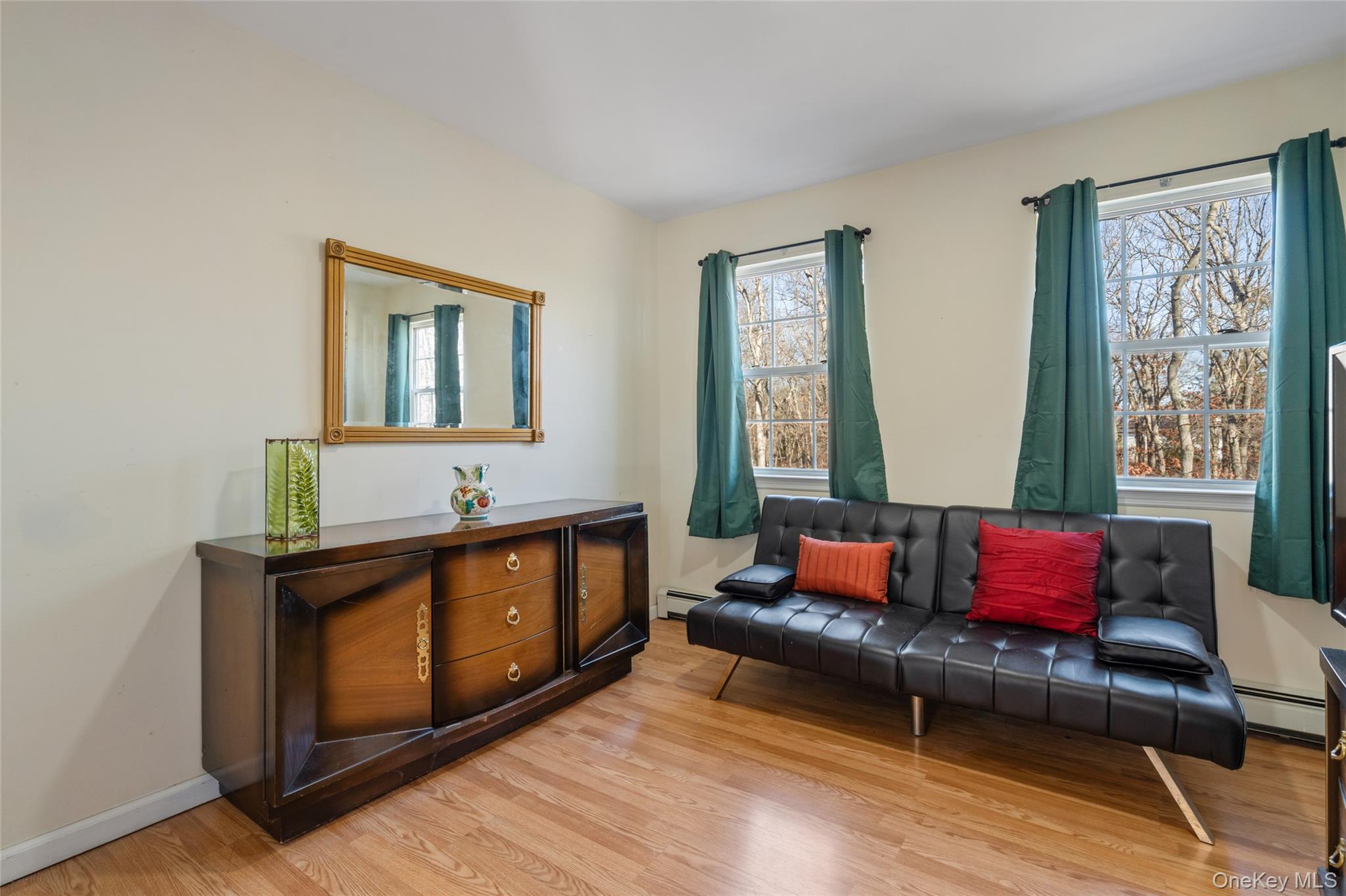 194 Miller Place Road Miller Place, NY 11764 - Photo 33 of 50 a living room with furniture and a dresser