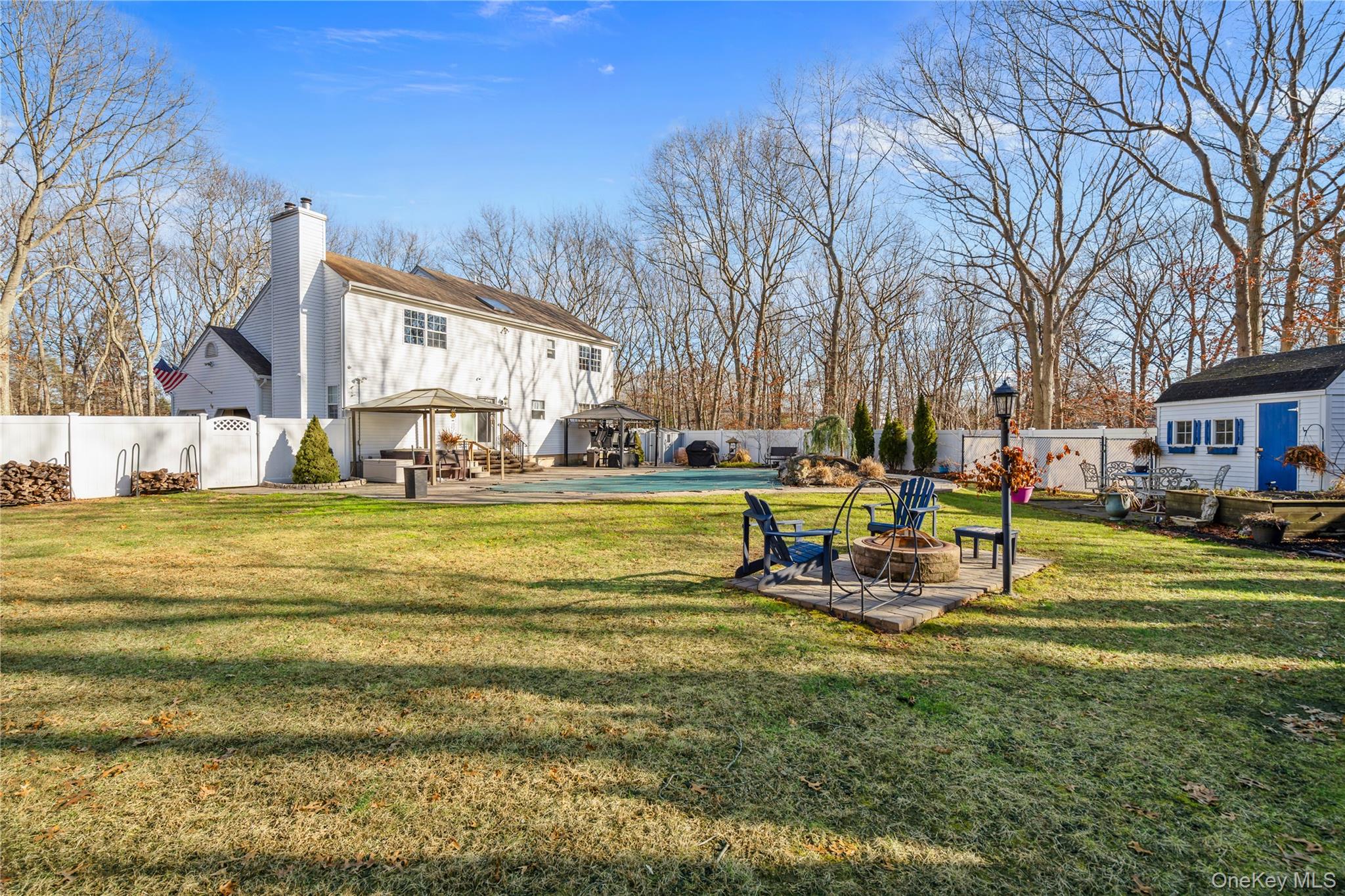 194 Miller Place Road Miller Place, NY 11764 - Photo 42 of 50 a view of a fountain in front of a house