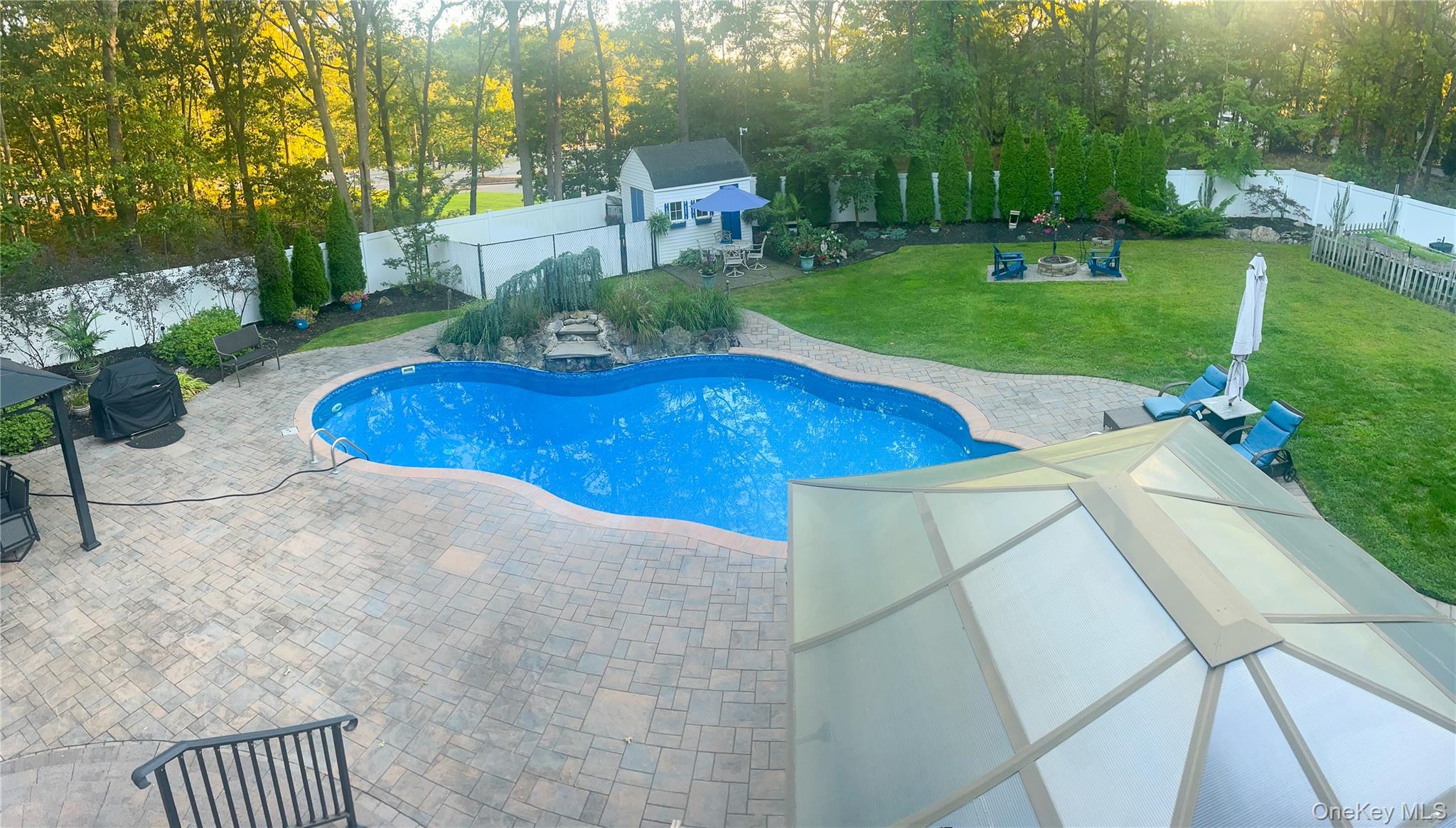 194 Miller Place Road Miller Place, NY 11764 - Photo 44 of 50 a view of a backyard with a garden and plants
