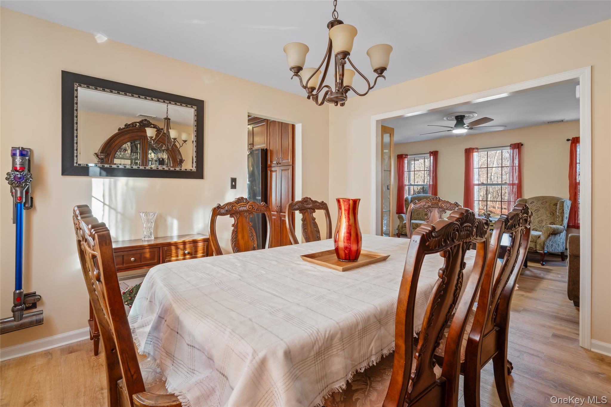 194 Miller Place Road Miller Place, NY 11764 - Photo 10 of 50 a view of a dining room with furniture window and wooden floor