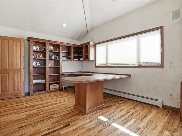 a view of kitchen and wooden floor