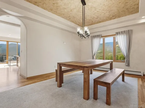 a view of a livingroom with furniture and window